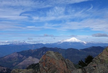 A stunning view of snow covered Mount Baker from the top of Sauk Mountain