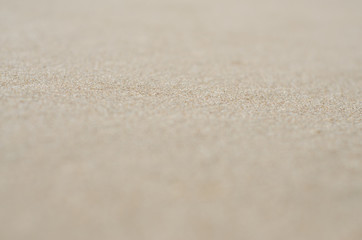 Fototapeta na wymiar Close up detail background sand beach on a sunny day