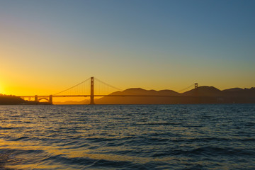 Fototapeta na wymiar Bridge Golden Gate at San Francisco sunset