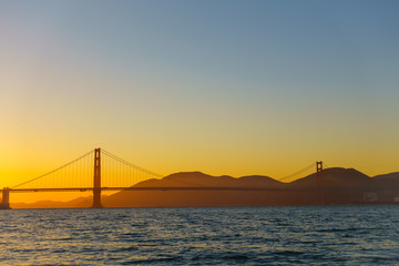 Fototapeta na wymiar Bridge Golden Gate at San Francisco sunset