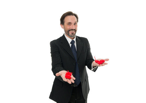 Take my heart. heart attack. businessman with beard in formal suit. Love and romance health care. February holiday. mature man hold valentines heart. Happy man with big red heart. Hard choice to make - Powered by Adobe
