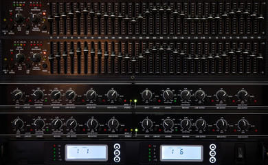 sound system by mixer equalizer in concert or wedding hall. image for background, and copy space.