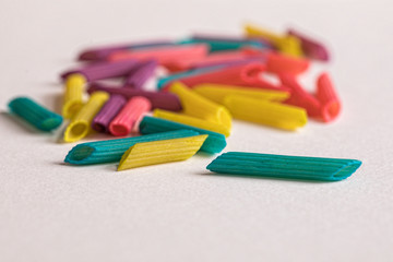 colored pasta, isolated, color on white, craft supplies, art, colorful, penne, macro, horizontal image