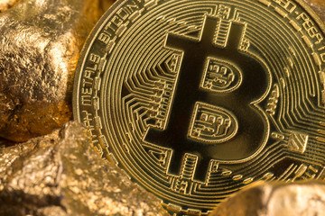 cryptocurrency golden coins - Bitcoin, Ethereum, Litecoin on the background of gold nuggets. Virtual money concept.