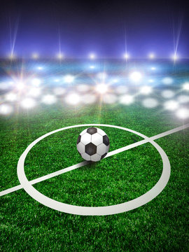 Soccer ball on the green field
