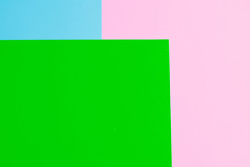 Soft pink, green and blue paper as texture background. Flat lay. Minimal concept. Creative concept. Pop Art. Bright Sweet fashion Style.