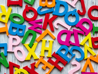 colored letters on a light background. day of knowledge. school.