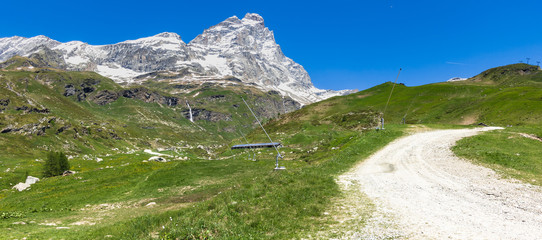 Panoramic view of the Matterhorn (Cervino) in a beautiful summer day, Breuil-Cervinia, Aosta Valley, Italy