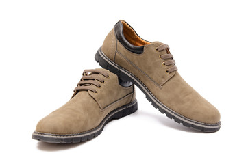 Brown suade shoes isolated on white background