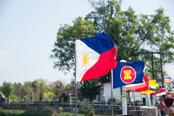 Asian flag on blue sky background.