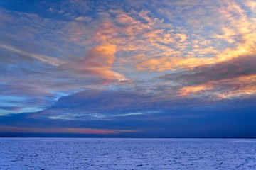 Fototapeta premium Sunset over frozen Lake