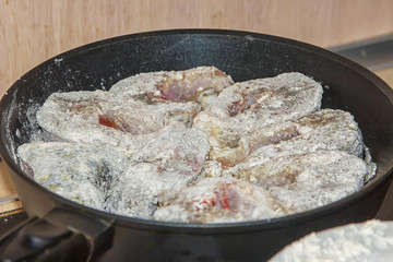 Delicious pike fillets will have roasted in the frying pan