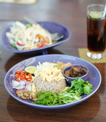 Thai food. Thai fried rice with shrimp paste and variety of vegetables served with sweet pork or chicken or known as Khao khluk kapi in Thai.