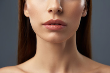 Charming young woman with beautiful full lips