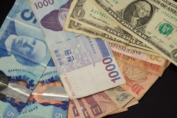 Obraz na płótnie Canvas Pile of Currencies