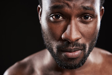 Upset young afro American man looking at you