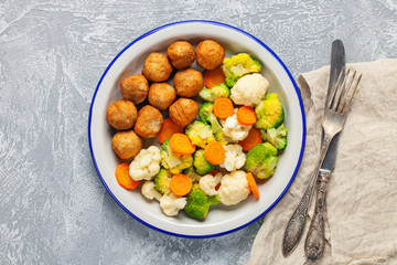Meatballs with broccoli and a cauliflower