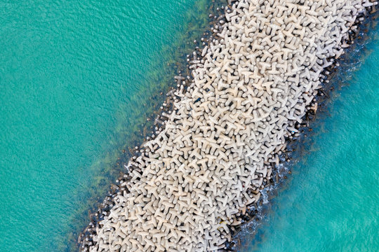 Tetrapod Breakwater in turquoise water, taken in Kuwait in December 2018 taken in hdr