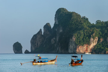 Fototapeta na wymiar Longtail boats anchored at Ao Loh Dalum on Phi Phi Don Island, Krabi Province, Thailand
