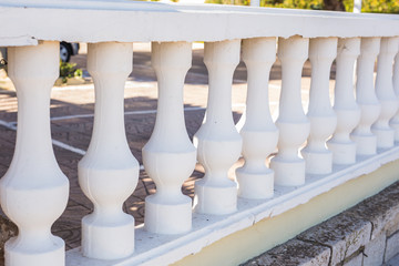 Exterior, design and building concept - Row of classic white balcony columns