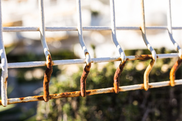 Exterior and design concept - Old white rusty fence, close up