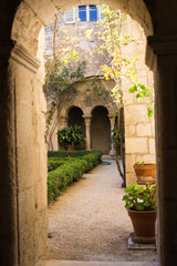 Fototapeta na wymiar Architecture, exterior and design concept - Arches of long niche leading in Mediterranean courtyard or patio.