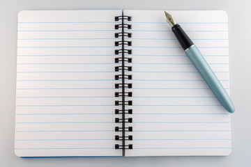 Fountain pen and a notebook