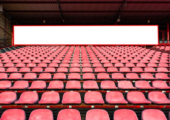 Advertising billboard at football stadium.
