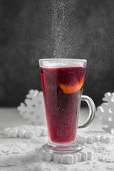 mulled wine on a winter snowy background