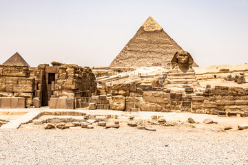 Egyptian Great Sphinx full body portrait head,with pyramids of Giza background Egypt empty with nobody. copy space