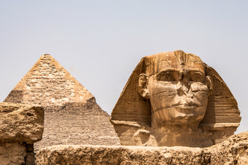 Egyptian Great Sphinx full body portrait head,with pyramids of Giza background Egypt empty with...