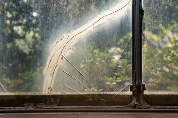 Broken glass in cracks in the background