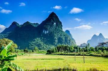 Obraz premium Karst mountains scenery with blue sky background