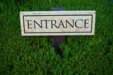 Entrance board in the grass