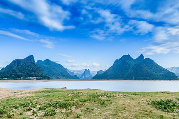 The mountains and river scenery with blue sky 