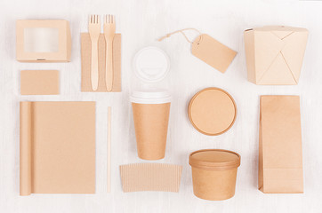 Fast food template for branding identity - blank kraft paper notebook, coffee cup, label, card, box for noodles, sushi, soup  on white wood board.