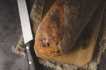 Homemade baguette with herbs