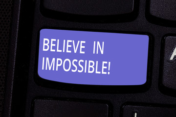 Conceptual hand writing showing Believe In Impossible. Business photo text Never give up hope that something amazing will happen Keyboard key Intention to create computer message idea