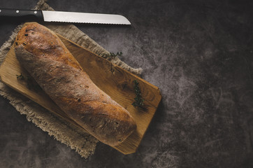 Homemade baguette with herbs