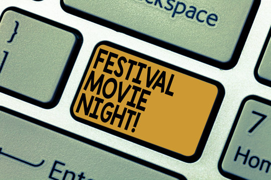 Word writing text Festival Movie Night. Business concept for analysisy friends get together to watch movies together Keyboard key Intention to create computer message pressing keypad idea