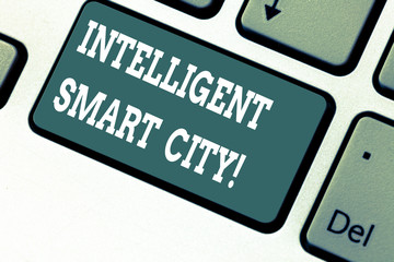 Writing note showing Intelligent Smart City. Business photo showcasing The city that has a smarter energy infrastructure Keyboard key Intention to create computer message pressing keypad idea