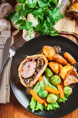 Pork tenderloin in wellington style in puff pastry