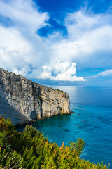 Greece, Zakynthos, Dramatic cloudscape sky over pretty white cliff at north cape skinari coast