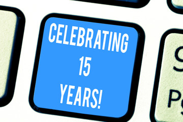 Word writing text Celebrating 15 Years. Business concept for Commemorating a special day after 15 years anniversary Keyboard key Intention to create computer message pressing keypad idea