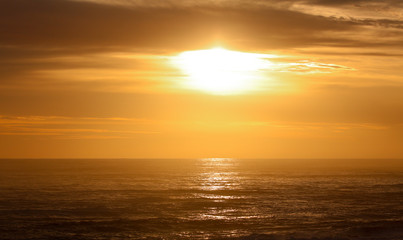 sun burst over ocean