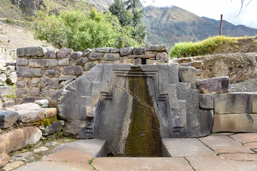 Cusco, Peru - Oct 22, 2018: "The bath of the princess", a fountain at the Ollantaytambo ruins