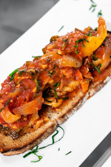 caldeirada de peixe spicy tomato fish stew on toast tapas