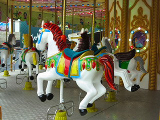 Fototapeta na wymiar 02.01.2019, Moldova, Chisinau: Traditional ‘Merry-go-round’ carousel horses