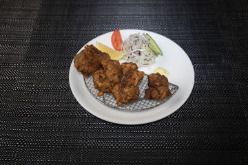 Close up view of plate with japanese food inside. Japan traditional food on wooden table.