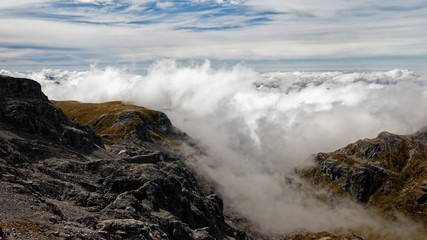 Fototapeta premium Cloud inversion east side of Mount Arthur on the route to Flora hut, Kahurangi National Park, New Zealand.
